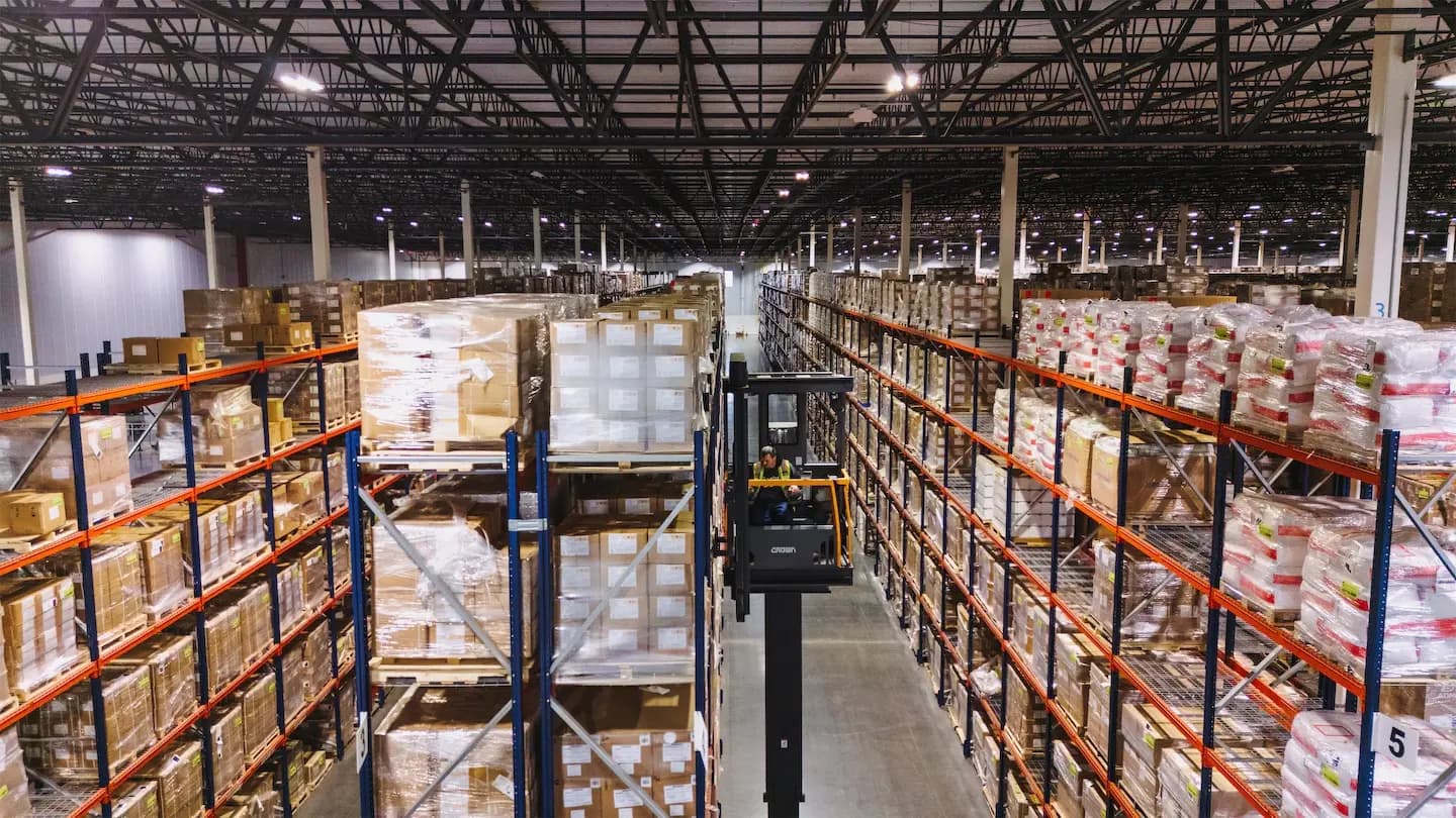 Warehouse aisle with racked inventory