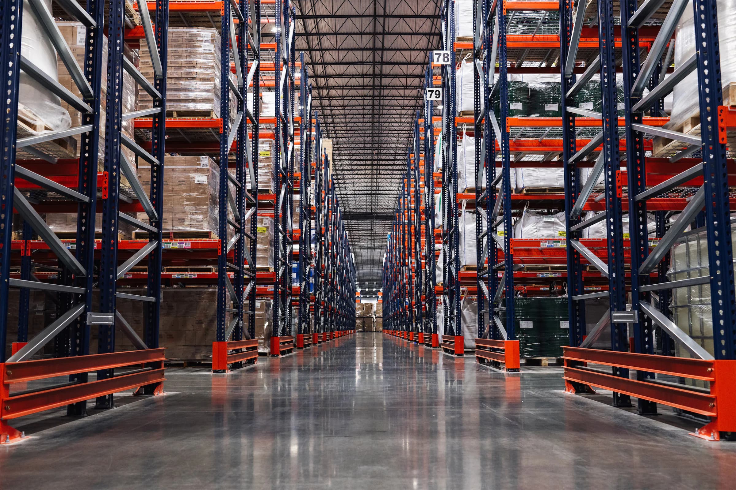 Warehouse aisle with industrial SKUs on racking